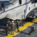 USS America aircraft is is prepared to move to the hangar bay