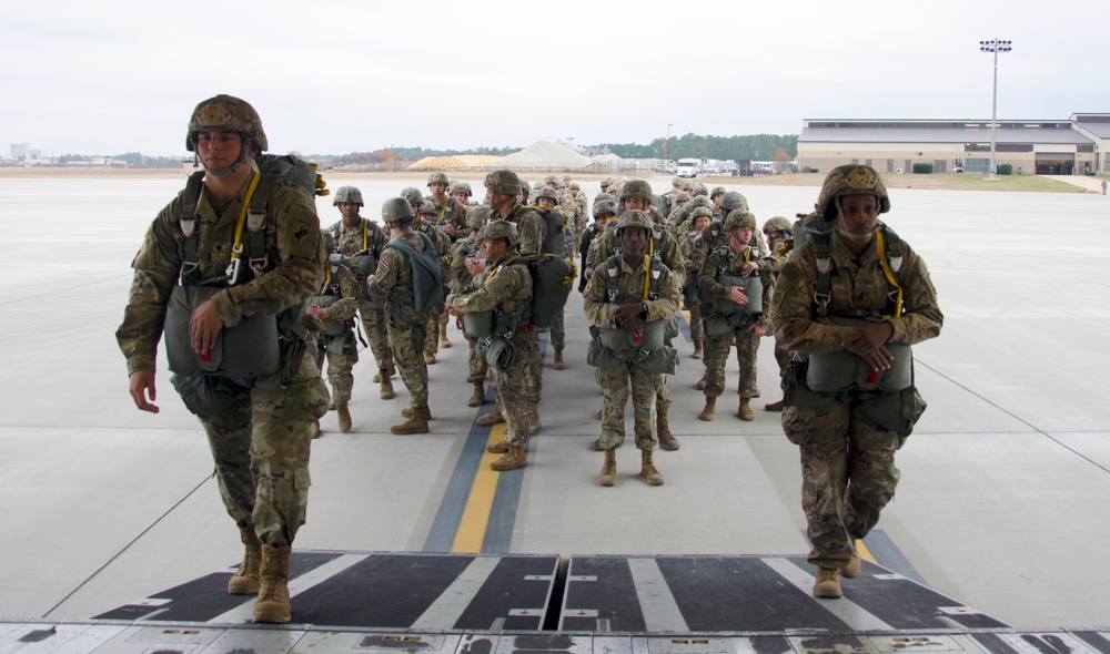 Paratroopers board C-17 ramp