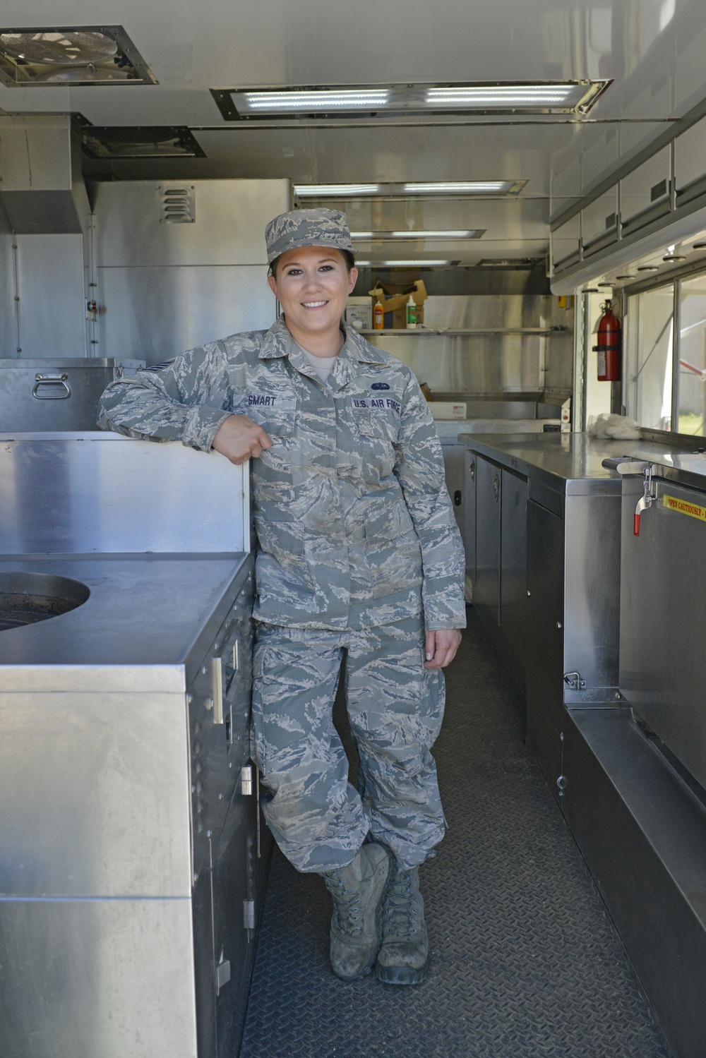 Staff Sgt Jessica Smart Poses for a photo inside the DRMKT