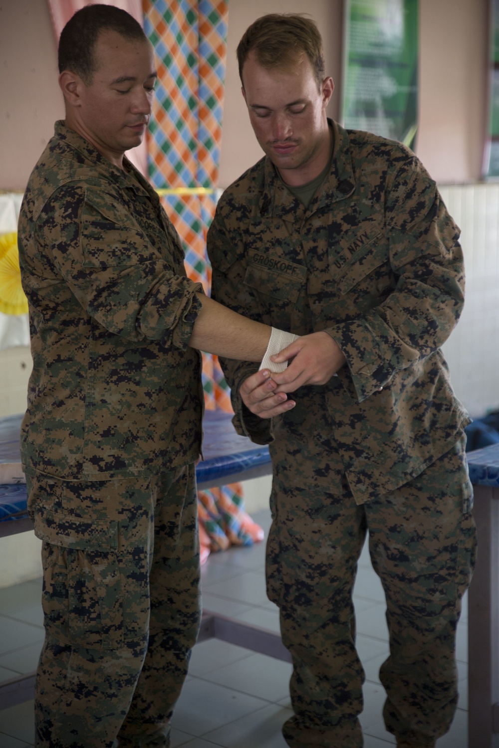 U.S. Navy, Malaysian Armed Forces medical officers teach basic life-saving skills to Malaysian school teachers