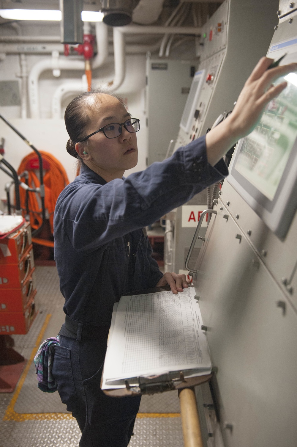 USS America Sailor checks equipment