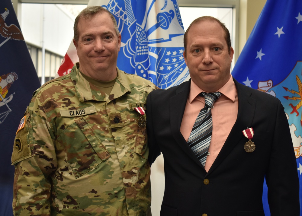 Claus brothers end military service together