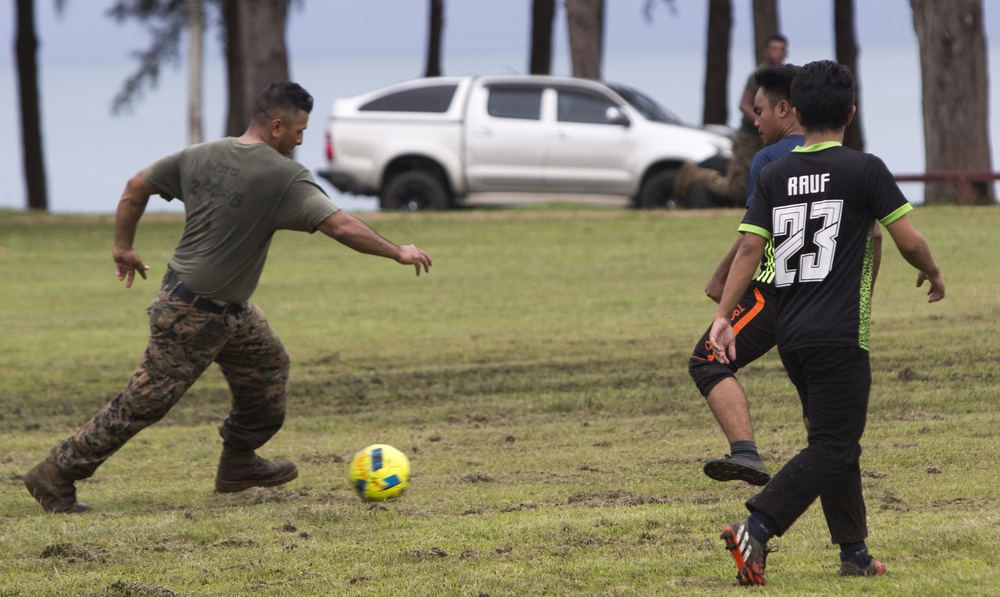 U.S. Marines with 2/1 play soccer against the Malaysian Armed Forces