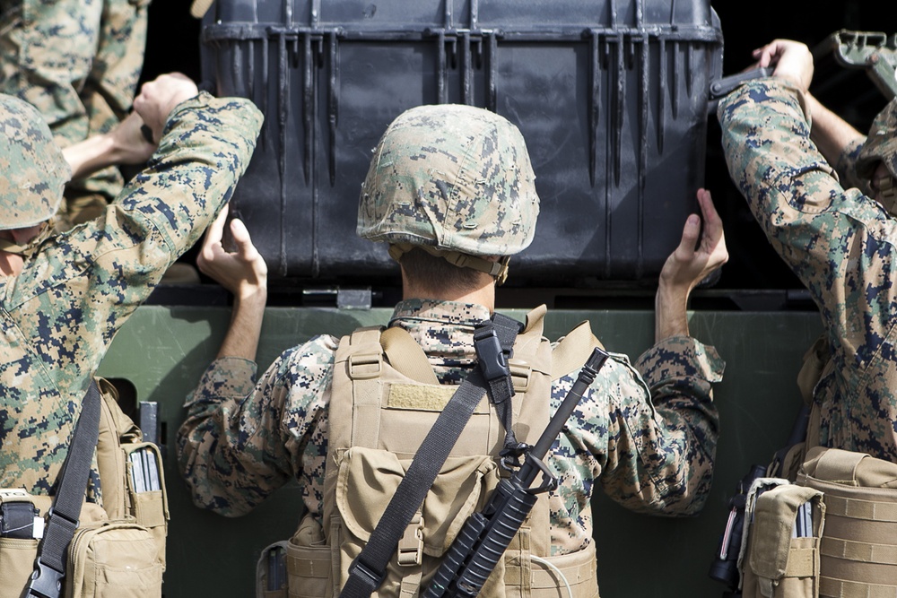 31st MEU Marines lean forward during MEUEX