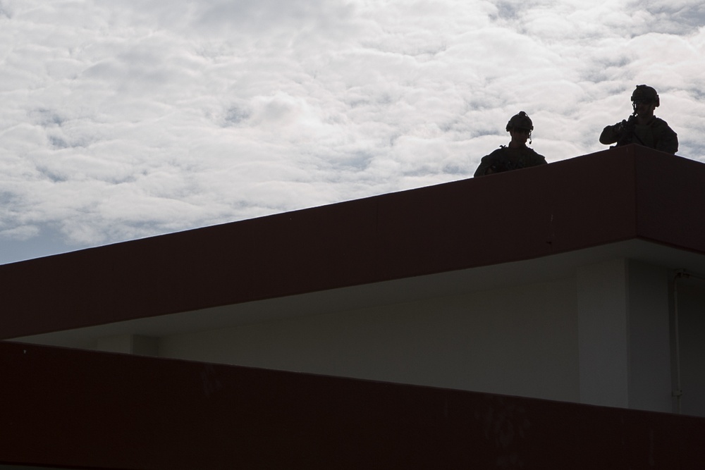 31st MEU Marines lean forward during MEUEX