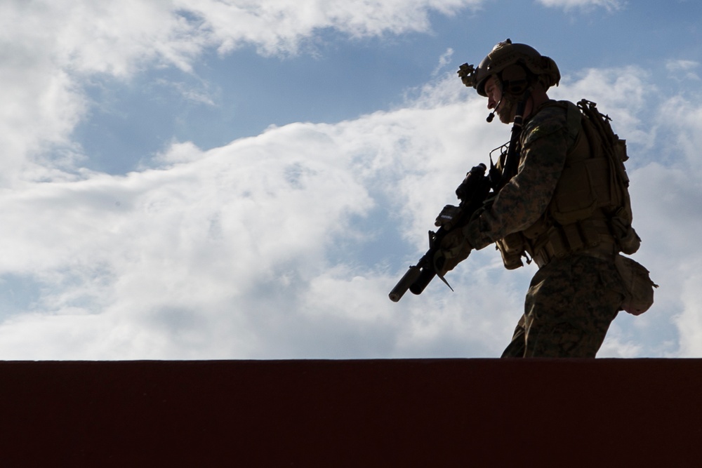 31st MEU Marines lean forward during MEUEX