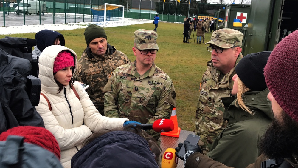 Cpt. Michael Doyle and Staff Sgt. Dennis Sincebaugh interview with local media