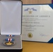 Lt. j.g. Aloysius H. Schmitt is awarded the Silver Star Medal