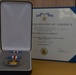Lt. j.g. Aloysius H. Schmitt is awarded the Silver Star Medal