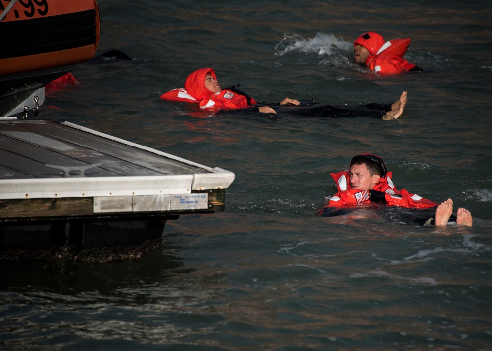 Coast Guard crewmembers train for emergency situations in Sand Key, Florida