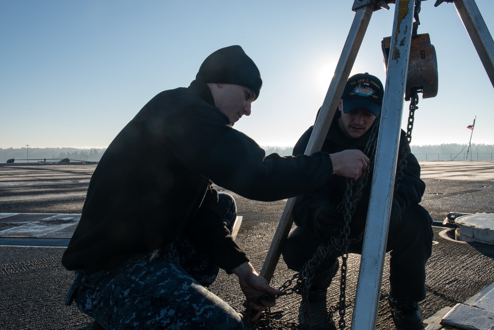 Sailors Conduct Maintenance