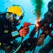 UCT-2, MDSU-1, USS Emory S. Land, and USS Frank Cable Divers Conduct Underwater Cutting Operations on Big Blue Mooring System in Apra Harbor