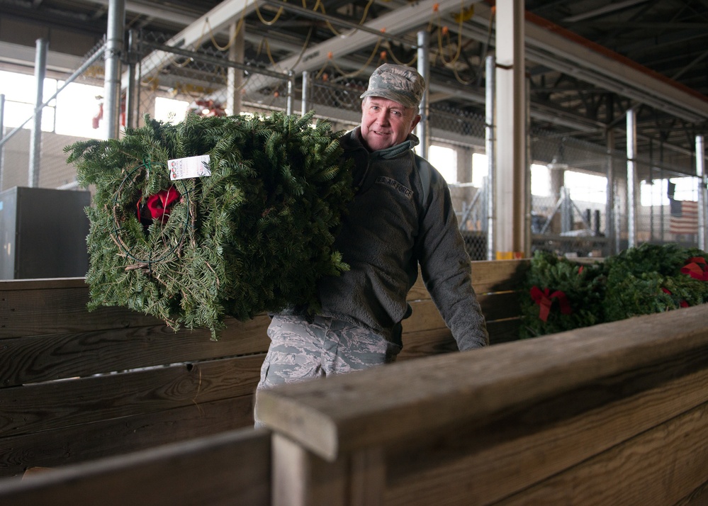 102nd Intelligence Wing Airmen receive and prepare wreaths for Wreaths Across America Event
