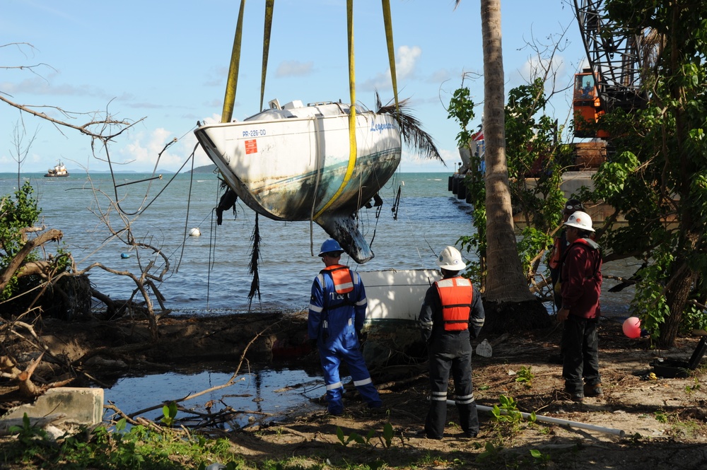 Hurricane Maria Salvage Crews Remove Wrecked Boat in Las Croabas, Puerto Rico