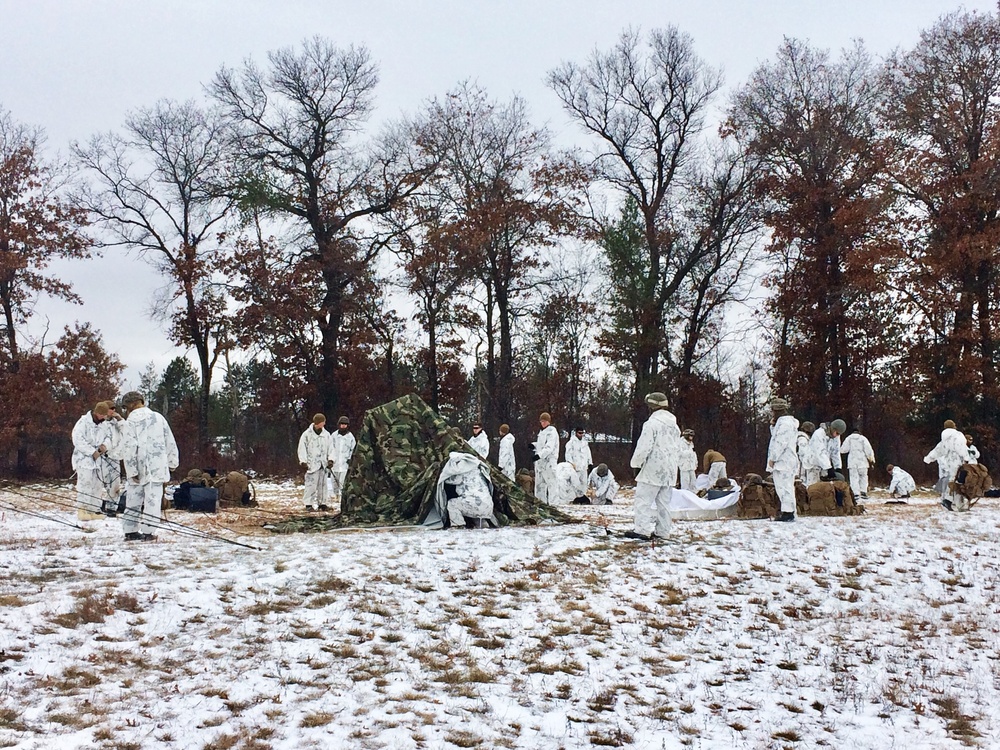 Cold-Weather Operations Course students practice tentbuilding at Fort McCoy