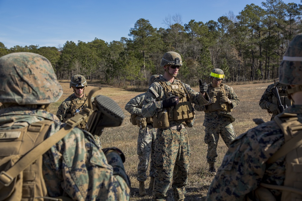 Charging forward: 1/2 assaults the objective, completes live-fire range