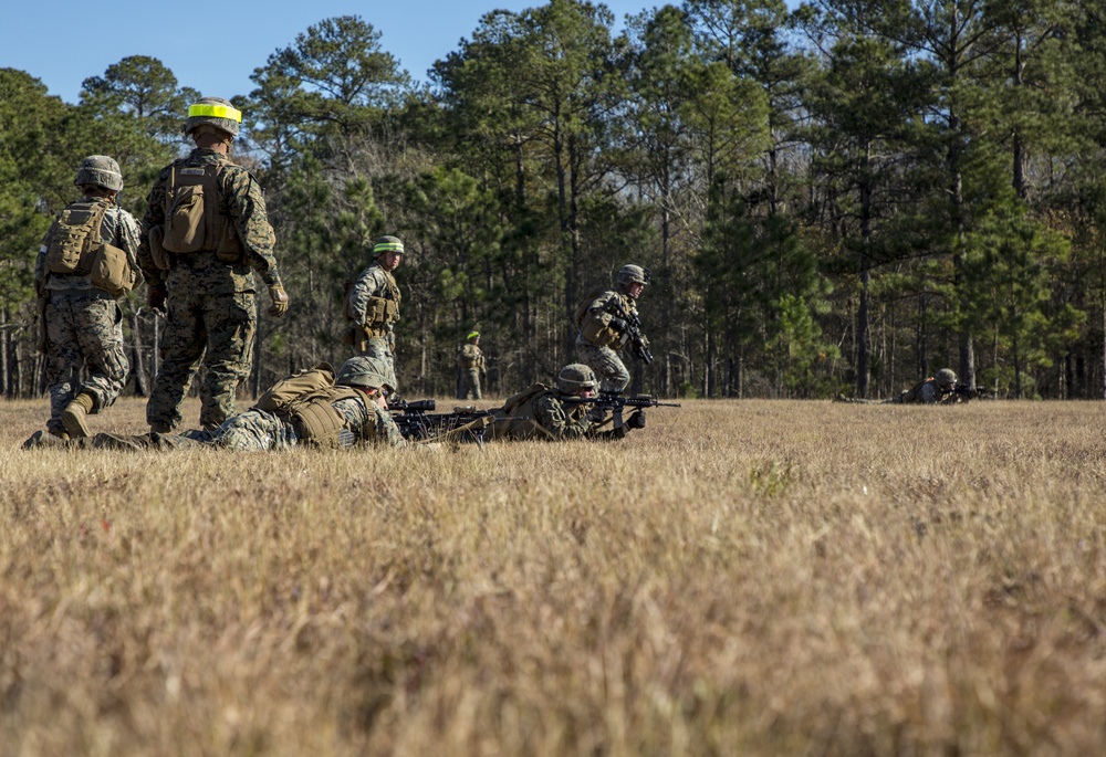 Charging forward: 1/2 assaults the objective, completes live-fire range