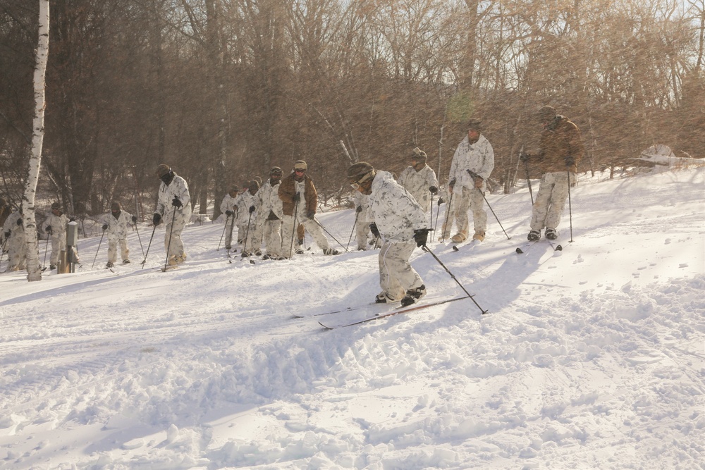 Cold-Weather Operations Course 18-01 students conduct skiing training at Fort McCoy