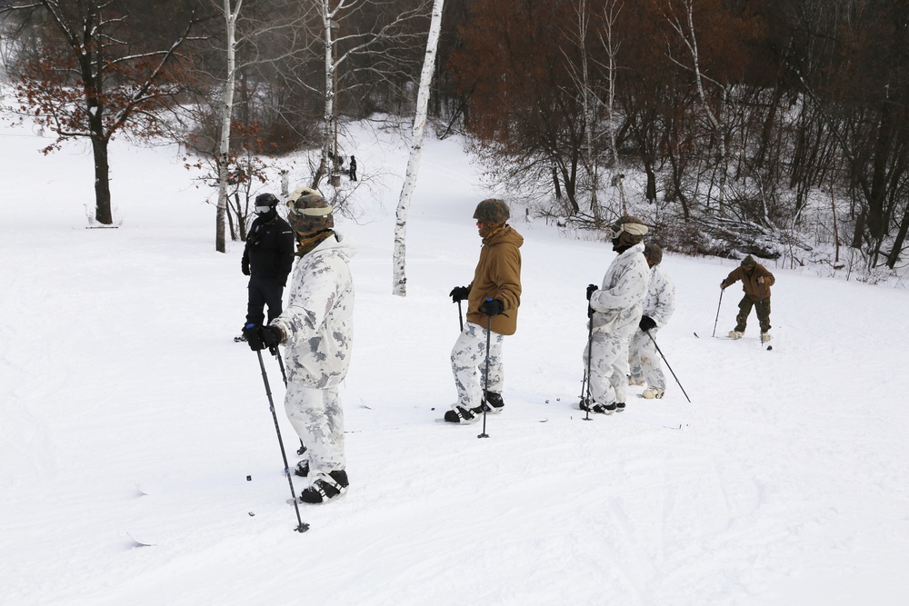 Cold-Weather Operations Course 18-01 students conduct skiing training at Fort McCoy