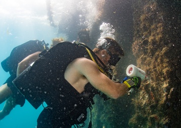 UCT-2 and MDSU-1 Conduct Underwater Pier Survey in Apra Harbor
