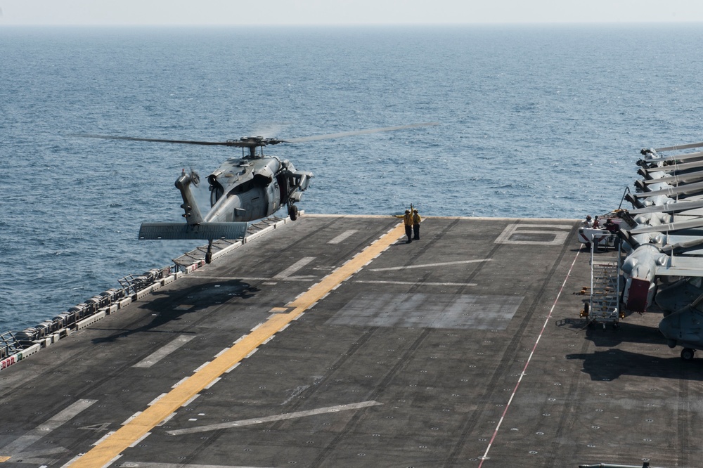 MH-60S Sea Hawk lifts off flight deck of USS America
