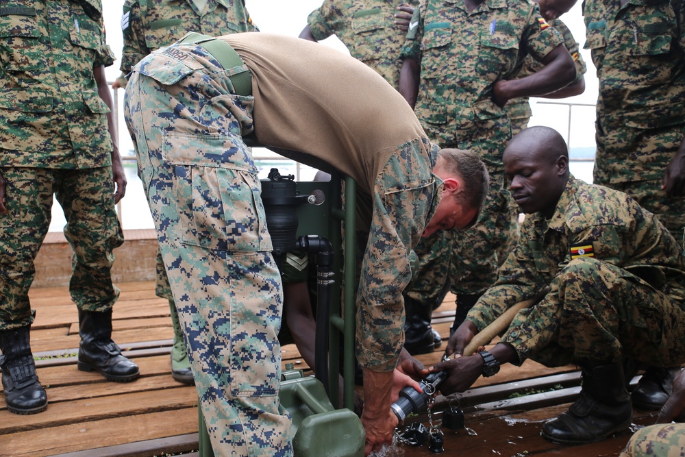 SPMAGTF-CR-AF Marines train UPDF soldiers on water purification