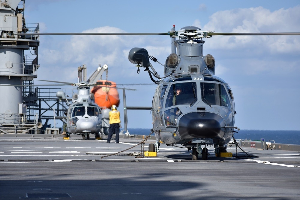 USS Puller conducts flight deck operations with Tonnerre’s helos