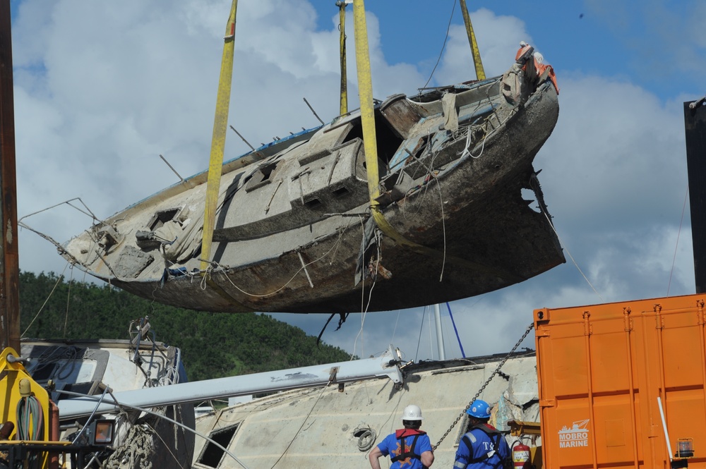 Hurricane Response Crews in Puerto Rico Move Wrecked Vessels off Crane Barge