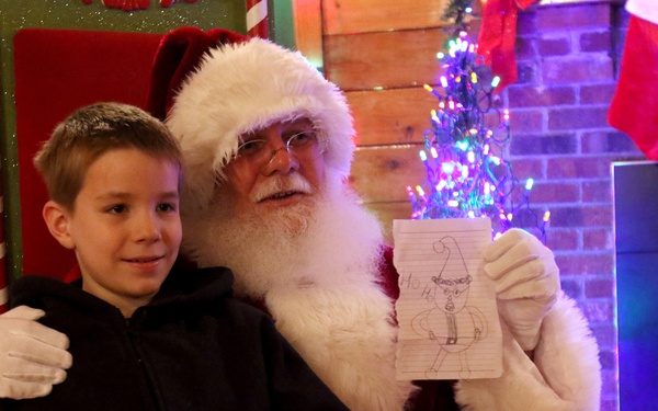 EFMP family members enjoy Story Time with Santa