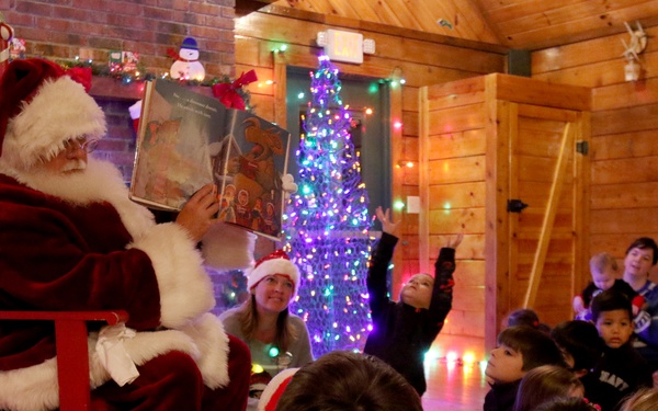 EFMP family members enjoy Story Time with Santa