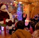 EFMP family members enjoy Story Time with Santa