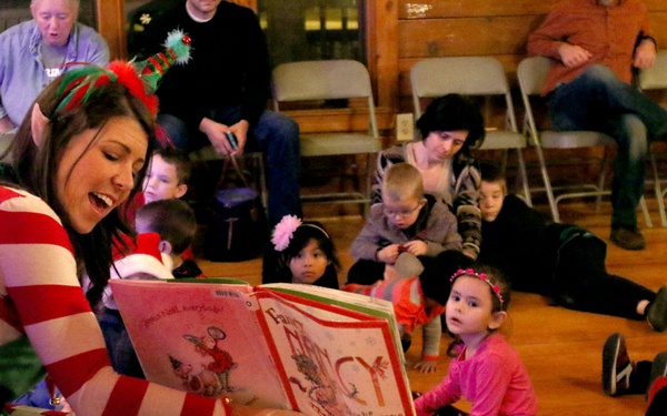 EFMP family members enjoy Story Time with Santa