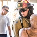Airman participate in a firefighter combat challenge