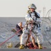 Airman participate in a firefighter combat challenge