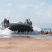 USS Pearl Harbor Sailors backload equipment