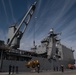 USS Pearl Harbor Sailors backload equipment