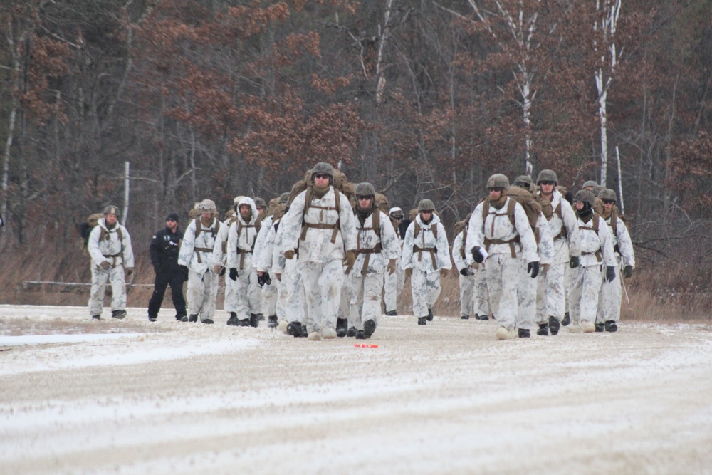 Cold-Weather Operations Course 18-01 students, all Marines, march to training at Fort McCoy