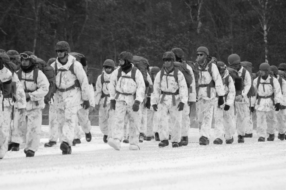 Cold-Weather Operations Course 18-01 students, all Marines, march to training at Fort McCoy