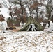 Cold-Weather Operations Course 18-01 students, all Marines, practice tentbuilding at Fort McCoy