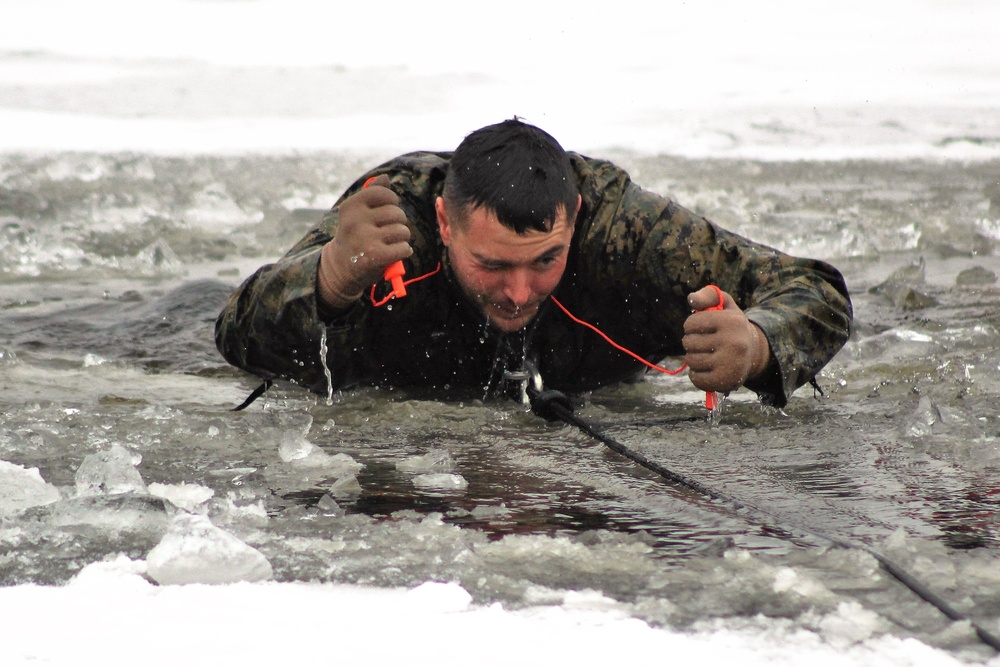 Fort McCoy Training: Marine takes plunge for cold-water immersion