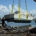 Hurricane response crews in Puerto Rico salvage vessel in Sardinera, Puerto Rico