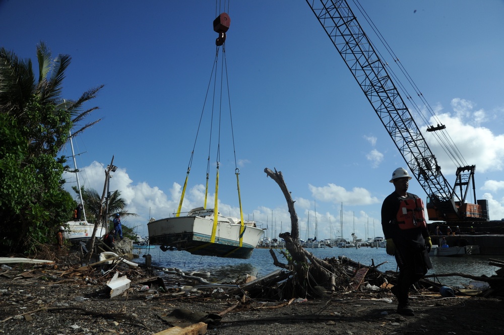 Hurricane response crews in Puerto Rico salvage vessel in Sardinera, Puerto Rico