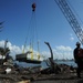 Hurricane response crews in Puerto Rico salvage vessel in Sardinera, Puerto Rico