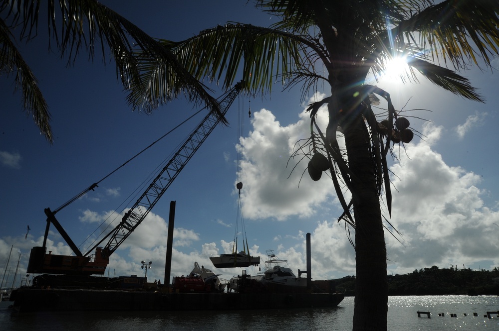 Hurricane response crews in Puerto Rico salvage vessel in Sardinera, Puerto Rico