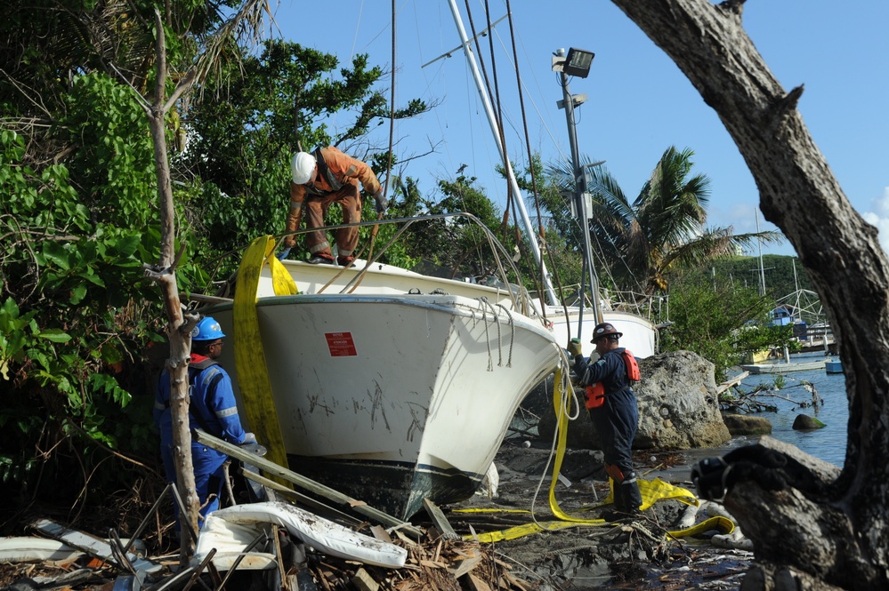 Hurricane response crews in Puerto Rico salvage vessel in Sardinera, Puerto Rico