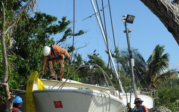 Hurricane response crews in Puerto Rico salvage vessel in Sardinera, Puerto Rico