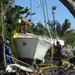 Hurricane response crews in Puerto Rico salvage vessel in Sardinera, Puerto Rico