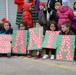 Santa flies with 28th OG giving gifts to families