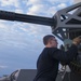 USS America (LHA 6) Sailors inspects CIWS