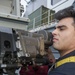 USS America Sailor removes weapons system reciever